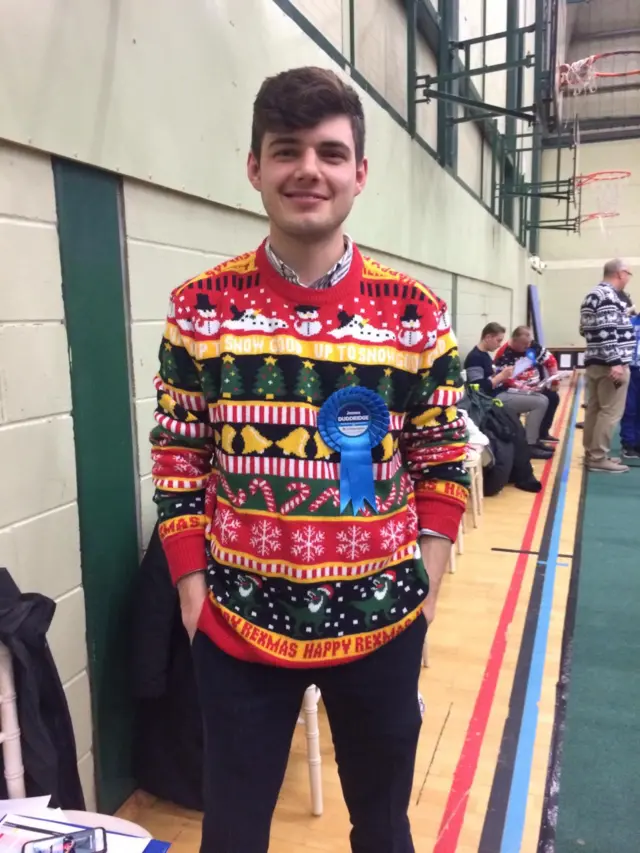 Man wearing Christmas jumper