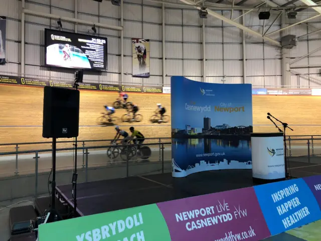 Cyclists on a velodrome