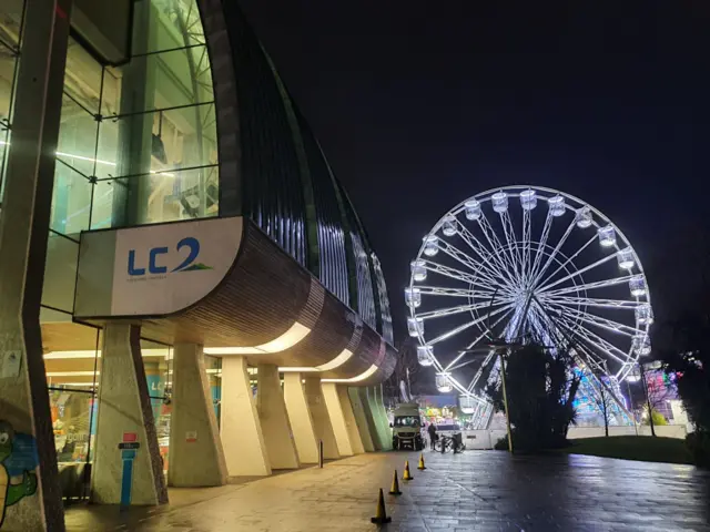 Ferris wheel outside of building