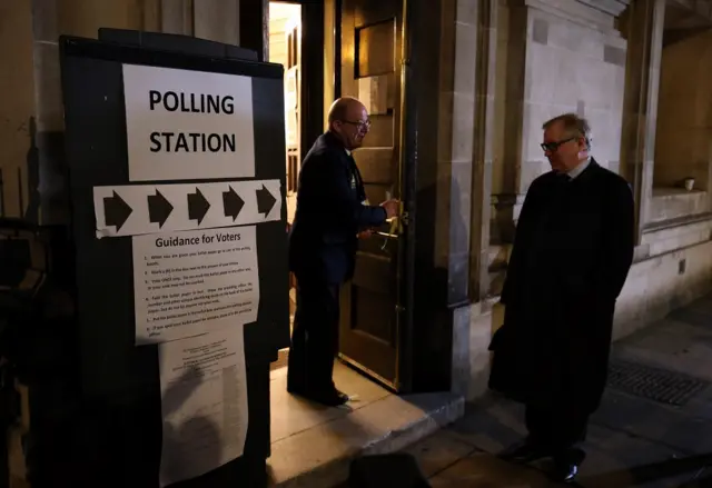 Methodist Central Hall polling station opens in London, as voters go to the polls in today's general election.