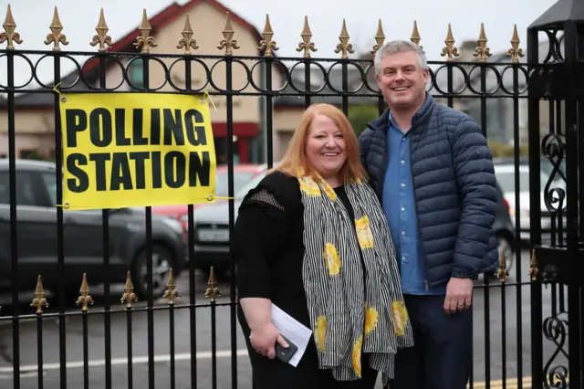 Leader of the Alliance Party Naomi Long and her husband Michael Long vote