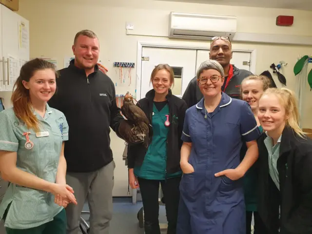 Josh Bailey (holding Freddie) and the vet team