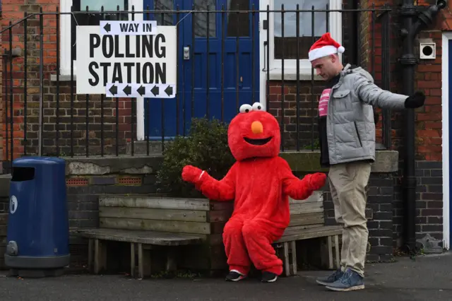 Elmo made an appearance outside the polling station at Pakeman Primary School in Islington, north London.
