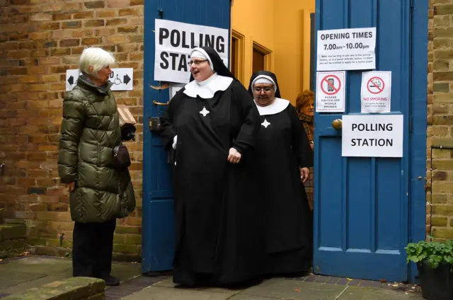 Nuns from the Tyburn Convent cast their vote at St. Johns church in London