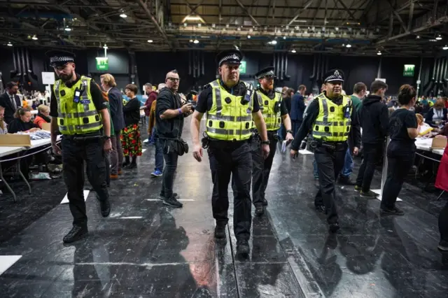 Police take away ballot papers in Paisley, near Glasgow