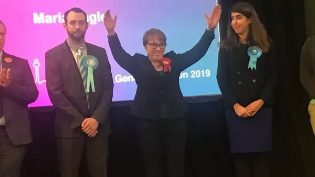 Maria Eagle celebrates her win in Garston and Halewood