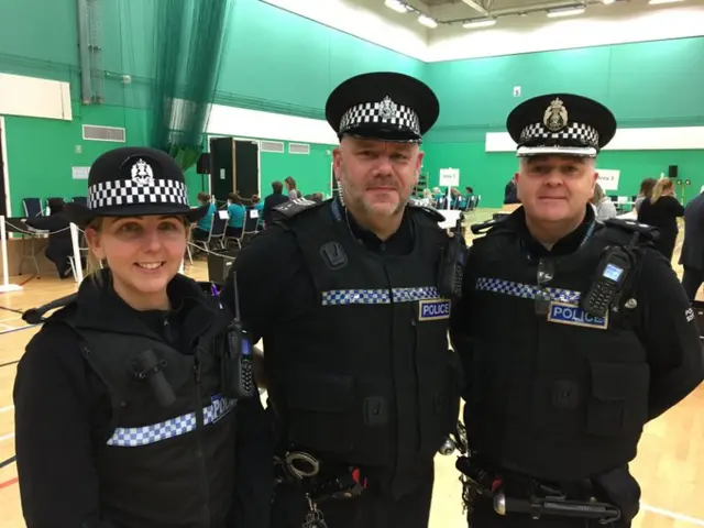 Three police officers