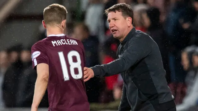 Daniel Stendel passes on instructions to forward Steven MacLean