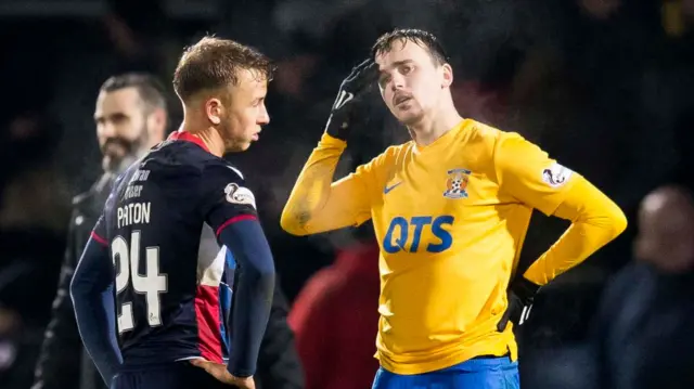 Kilmarnock's Liam Millar (right) is despondent at full-time