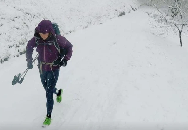 Rosie Watson running in snow