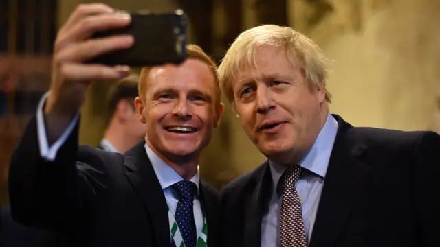 Boris Johnson poses for a selfie