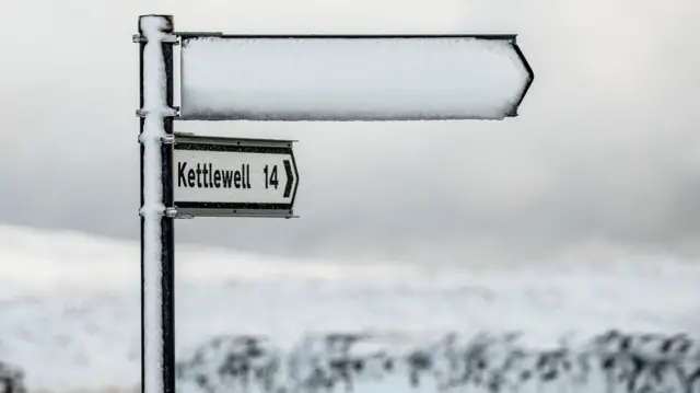 Snowy sign