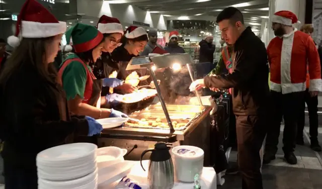 Food being served at the station in 2018