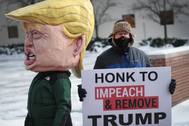 A man protesting in Michigan