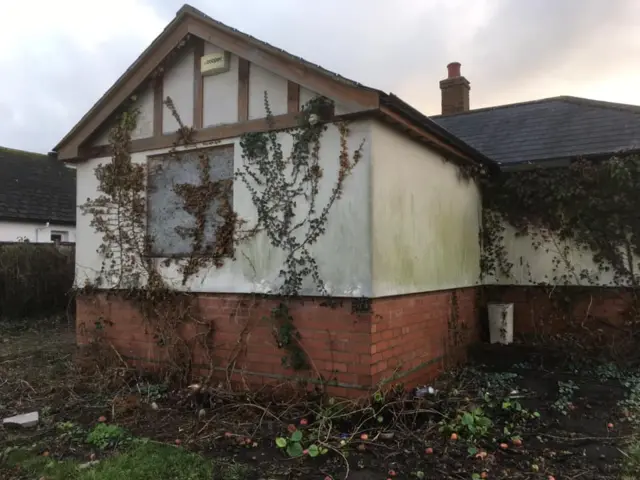 A boarded-up house