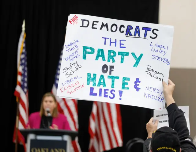 Anti-Democrat protester sign