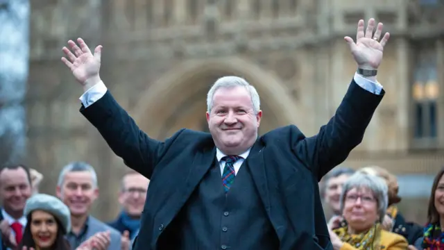 Ian Blackford with SNP MPs in Westminster, London after the party won 47 seats in Scotland in the general election.