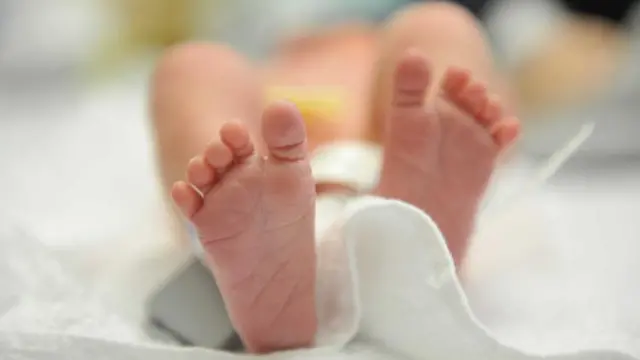 Baby's feet stock image