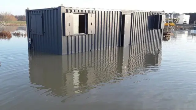 Building partially submerged in water