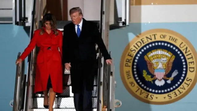 Donald and Melania Trump arrive at Stansted