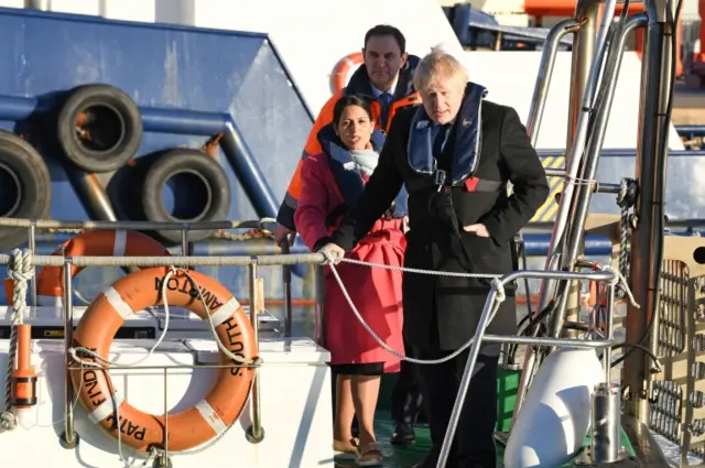 Priti Patel and Boris Johnson