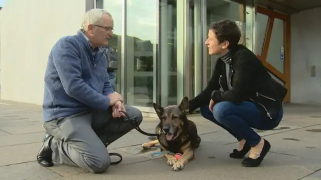 PC Dave Wardell and Finn met Scotland's minister for rural affairs, Mairi Gougeon, at Holyrood