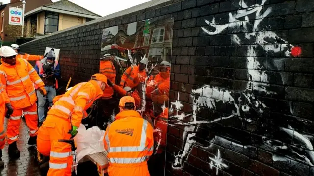 The plastic being removed