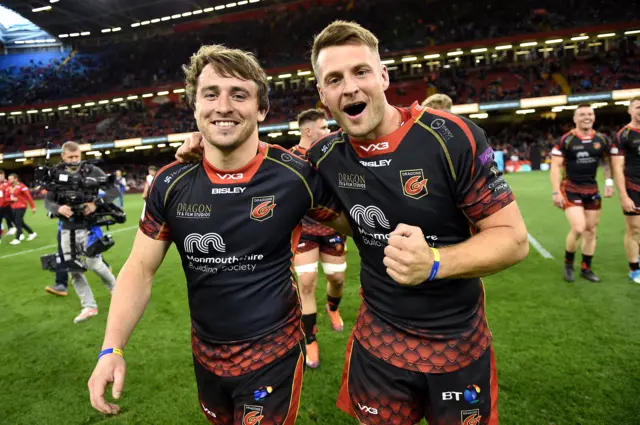 Dragons celebrate beating Scarlets in April 2019