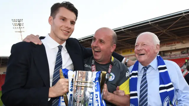 Wigan celebrate.