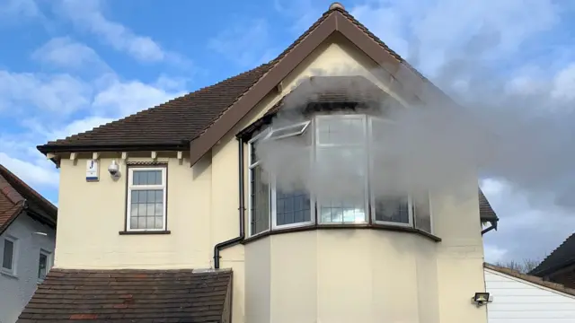 Smoke coming from house