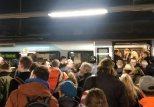 Passengers boarding train