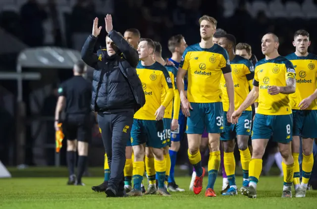 Celtic manager Neil Lennon and his players celebrate at full-time