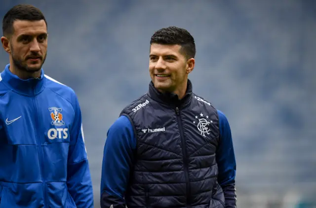 Kilmarnock's Gary Dicker and Rangers' Jordan Jones