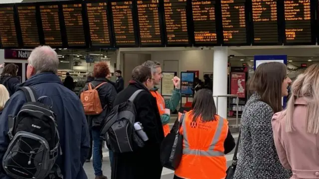 Passengers at a railway station