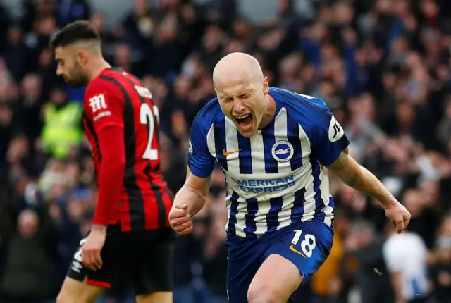 Aaron Mooy celebrates