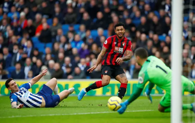 Brighton & Hove Albion's Mathew Ryan saves a shot from Bournemouth's Joshua King