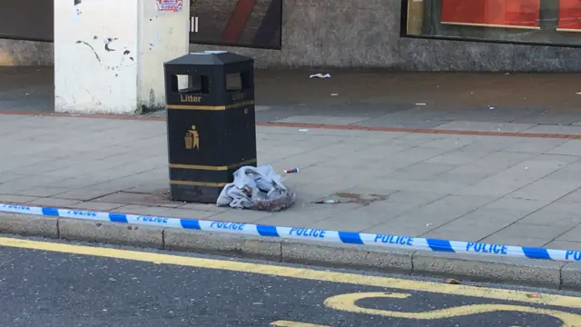 A bin near the scene