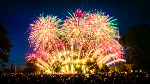 Thousands of people watch a fireworks display, as the UK's finest fireworks companies compete during the Fireworks Champions at Newby Hall in Yorkshire.