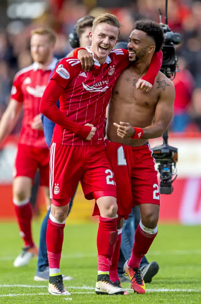 James Maddison celebrates his last-minute winner with Shay Logan