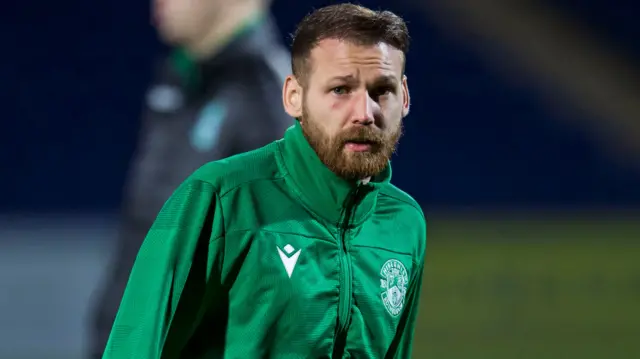 Hibs winger Martin Boyle warming up in Dingwall