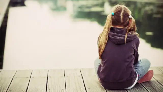 Child sitting down