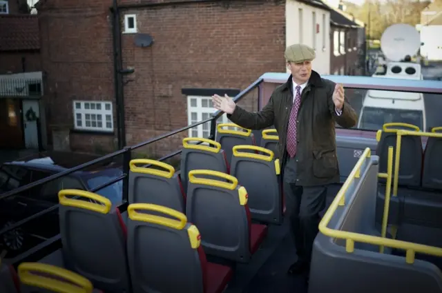 Brexit Party leader Nigel Farage campaigns on party"s battle bus outside Barnby Memorial Hall during election campaigning on December 03, 2019 in Worksop, England.