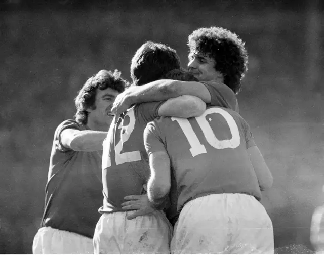 Gordon Smith (no10) is mobbed by Rangers teammates Sandy Jardine and Derek Johnstone after grabbing the winner in the 1978 final against Celtic