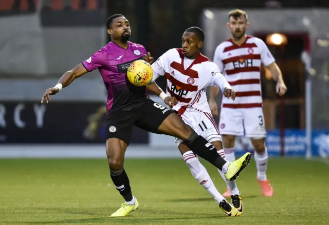 St Mirren's Jonathan Obika (left) vies for possession with Hamilton's Mickel Miller