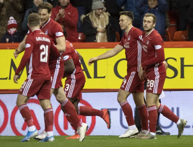 Andrew Considine celebrates his goal against Rangers