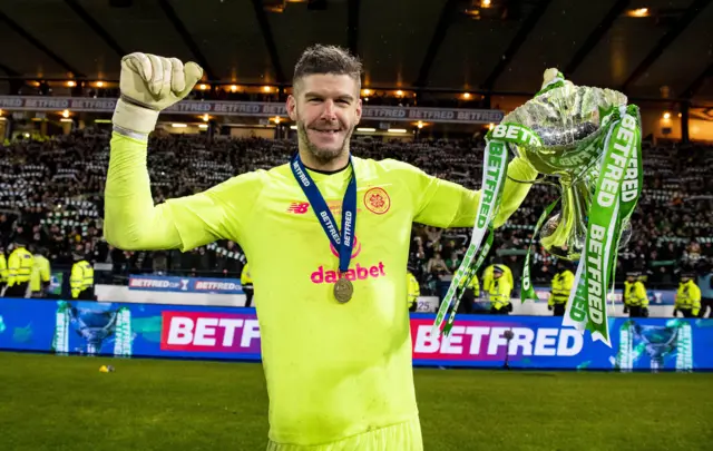 Celtic goalkeeper Fraser Forster celebrates with the League Cup