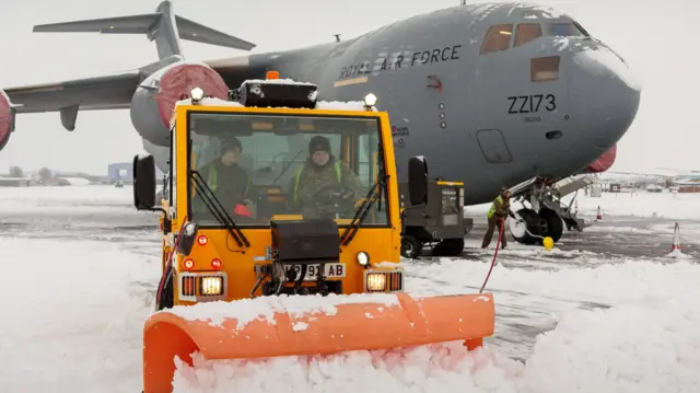 A snow plough on the move at RAF Brize Norton.