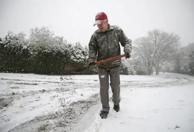 A man gritting the road in Basingstoke, Hampshire