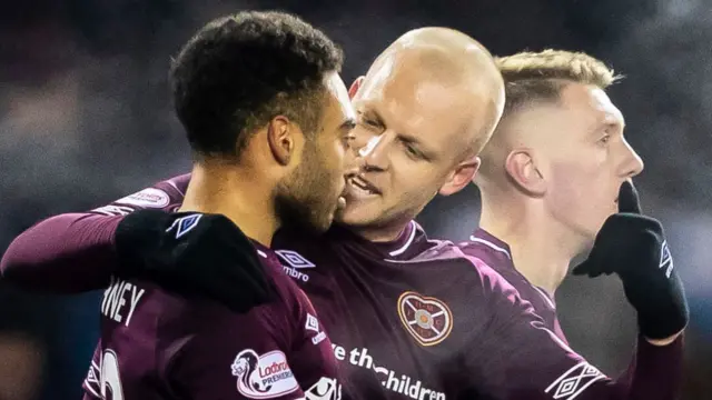 Hearts' Sean Clare and Steven Naismith celebrate