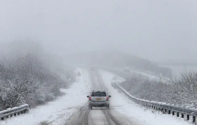 A driver in sleet and snow in Berkshire